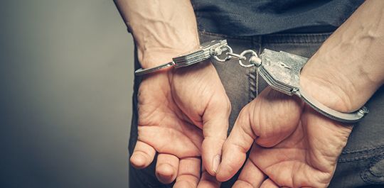 Man in handcuffs - Danbury criminal defense attorney